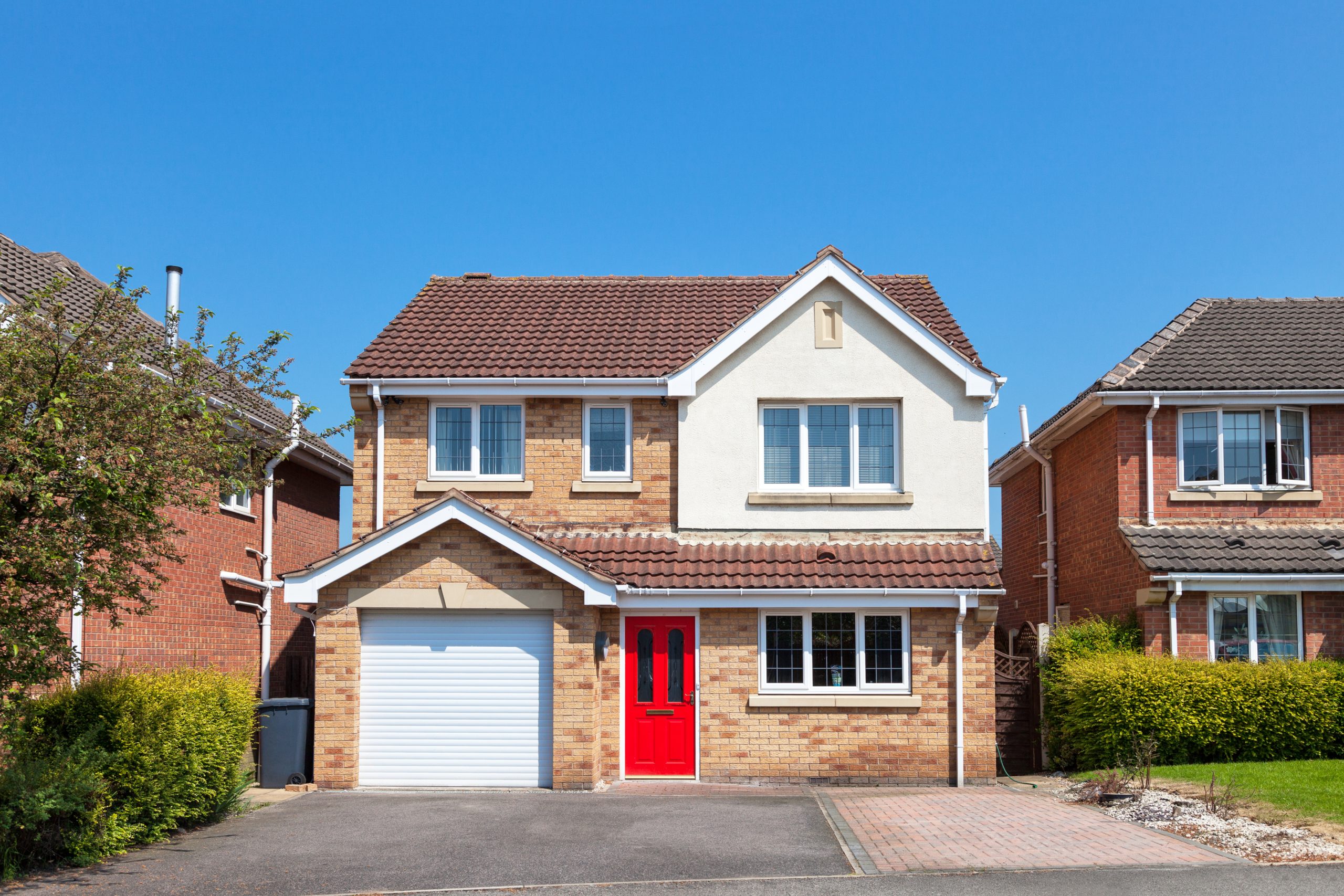 Elegant,English,House,With,Red,Door